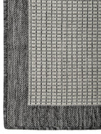 Detalle de textura tejida de alfombra Sisalo White and Gris