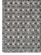 Detalle de la trama tejida de alfombra Sisalo Trilenium gris.