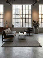 Alfombra Sisalo Trilenium gris en ambiente de estilo industrial y contemporáneo.
