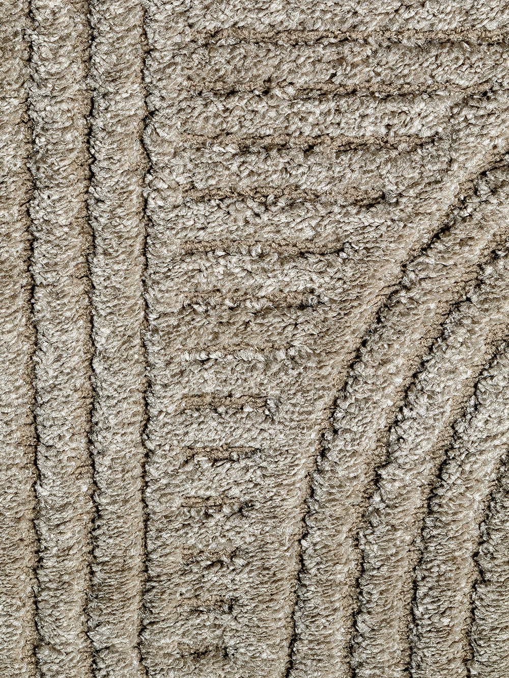 Detalle de textura del tapete Aloy Arch Vison