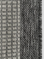 Detalle de trama y tejido de alfombra Sisalo White and Gris