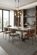 Alfombra Sisalo Trilenium gris en comedor contemporáneo de estilo elegante.